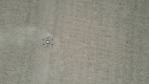 Agricultural technology drones.Drone spraying over fields. Stock Footage 157078722