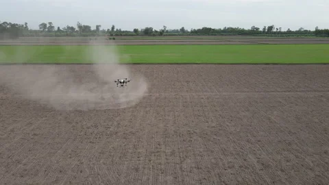 Agricultural technology drones.Drone spraying over fields. Stock Footage 157079343
