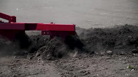 Agricultural tractor plowing a field 動画素材 223687746