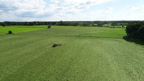 Agricultural tractor returns grass for the haymaking Video stock 117531841