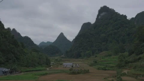 Agricultural Valley Surrounded By Limestone Mountains In Cao Bang Stock Footage 336721399
