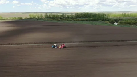 Agricultural work in the field in spring 스톡 동영상 232396936