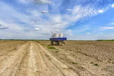 Agricultural work in the field in spring. Stock Photos