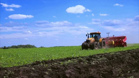 Agriculture tractor seeding plants Video stock 64306982