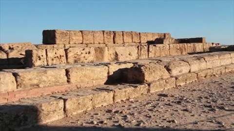 Agrigento sicily italy ancient large stones bricks brickwork pan left to right Stock Footage 252154153