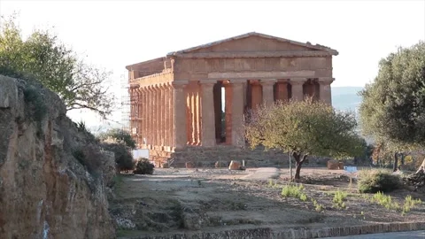 Agrigento sicily italy ancient temple of concordia wide shot with trees Stock Footage 252154460
