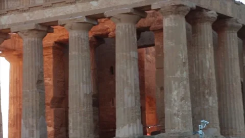 Agrigento sicily italy ancient temple of concordia pillars close up pan Stock Footage 252154484