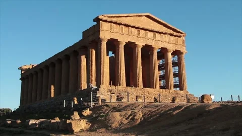 Agrigento sicily italy ancient temple of concordia pillars wide shot with zoom Stock Footage 252154493