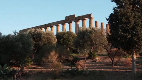 Agrigento sicily italy ancient temple of juno pillars on mountain top peak hill Stock Footage 252154530