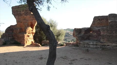 Agrigento sicily italy mountain top mountaintop cliff ancient ruins by temple Stock Footage 252154380