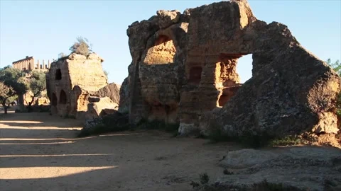 Agrigento sicily italy mountain top mountaintop cliff ancient ruins wide medium Stock Footage 252154385