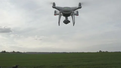 Agro drone works on the field. Field treatment with chemicals. Stock Footage 188813632
