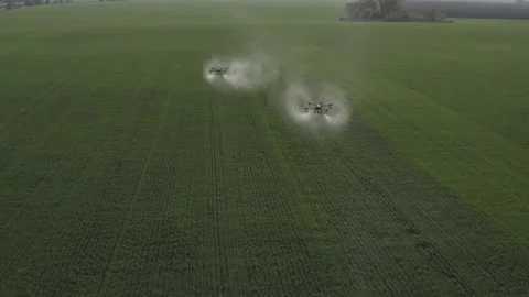 Agro drone works on the field. Field treatment with chemicals. Stock Footage 188825836