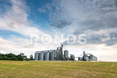 Agro-processing plant for processing and silos for drying cleaning and storag Stock Photos