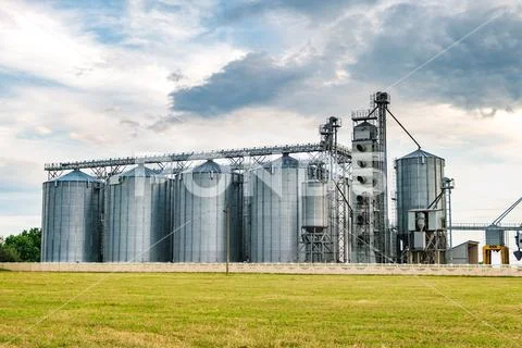 Agro-processing plant for processing and silos for drying cleaning and storag Stock Photos