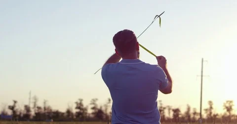An agronomist is checking plants on a field Stock Footage 76622567