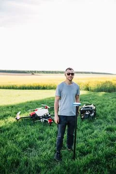 Agronomist Using Technology in Agricultural Corn Field. Stock Photos
