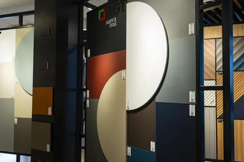 AGT decorative wall panel samples displayed in a building materials showroom Stock Photos