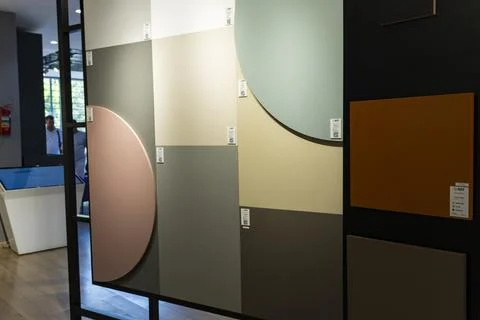 AGT decorative wall panel samples displayed in a building materials showroom Stock Photos