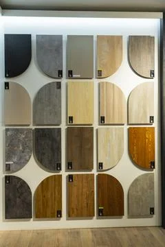 AGT decorative wall panel samples displayed in a building materials showroom Stock Photos