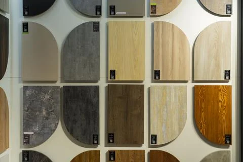 AGT decorative wall panel samples displayed in a building materials showroom Stock Photos