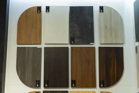 AGT decorative wall panel samples displayed in a building materials showroom Stock Photos