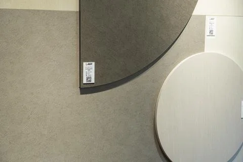 AGT decorative wall panel samples displayed in a building materials showroom Stock Photos