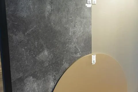 AGT decorative wall panel samples displayed in a building materials showroom Stock Photos