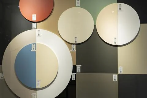 AGT decorative wall panel samples displayed in a building materials showroom Stock Photos