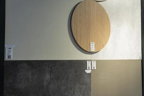 AGT decorative wall panel samples displayed in a building materials showroom Stock Photos