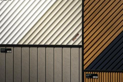 AGT decorative wall panel samples displayed in a building materials showroom Stock Photos