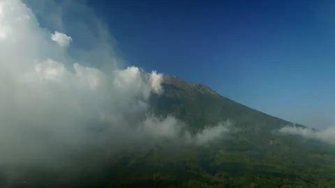 Agung volcano with clouds. Drone view of Bali. Stock Footage 255789091