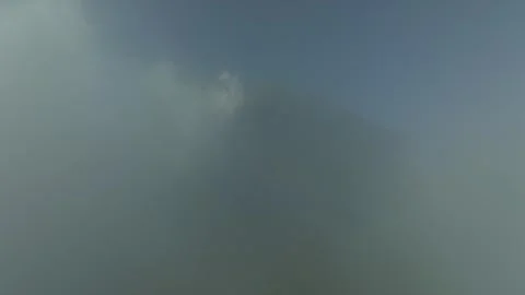 Agung volcano with clouds. Drone view of Bali. Stockbeeldmateriaal 257423239