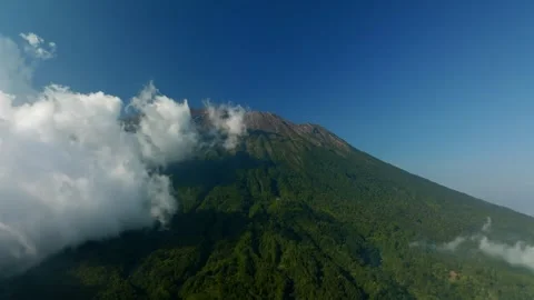 Agung volcano with clouds. Drone view of Bali. Stock Footage 257829557