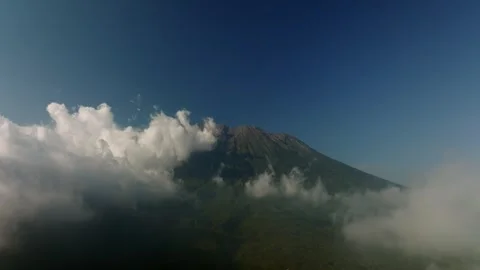 Agung volcano with clouds. Drone view of Bali. Stock Footage 258330697