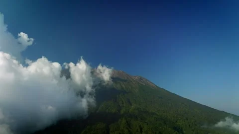 Agung volcano with clouds. Drone view of Bali. Stockbeeldmateriaal 259685403