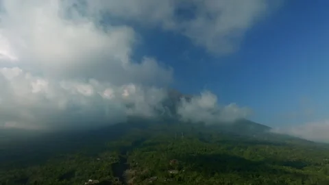 Agung volcano with clouds. Drone view of Bali. Stock Footage 260390116