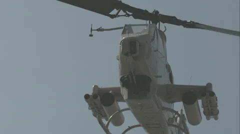 AH-1 Cobra Gunship Attack Helicopter Flying in Slow Motion 3 Stock Footage 64314156