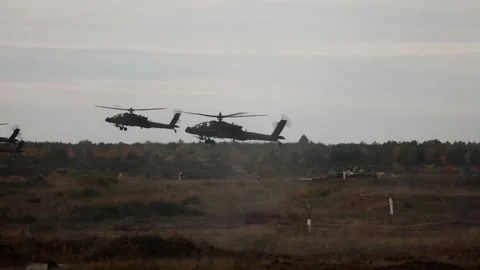 The AH-64 Apache is an American twin-turboshaft attack helicopter 016 Stock Footage 166438830