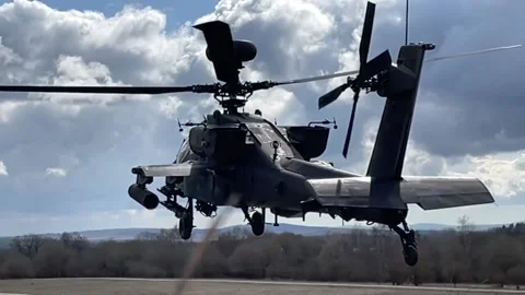 The AH-64 Apache is an American twin-turboshaft attack helicopter 021 Video stock 166438911