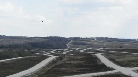 The AH-64 Apache is an American twin-turboshaft attack helicopter 029 Stock Footage 166439054
