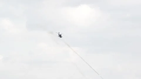 The AH-64 Apache is an American twin-turboshaft attack helicopter 028 Stock Footage 166439074