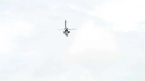 The AH-64 Apache during the Aerobatic Flying Displays at Singapore Airshow Vídeo Stock 67190235