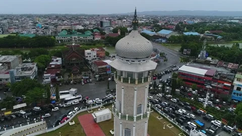 AH - Aerial view, praying for Eid in the courtyard of the Baiturrahman Mosque Stock Footage 237824714