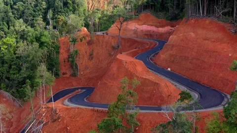 AH - Aerial View of Road Between Tropical Foreset in Aceh Province, Indonesia Video stock 241402172