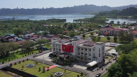 AH - Aerial View of Small Coastal Village Stock Footage 237828339