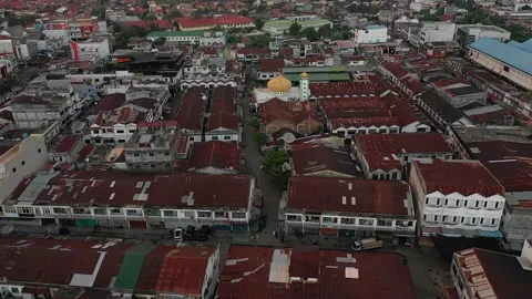 AH - Small Mosque in The Middle of a Small Town Stock Footage 172069544