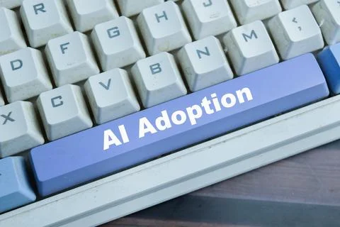 AI adoption on the button keyboard. Stock Photos