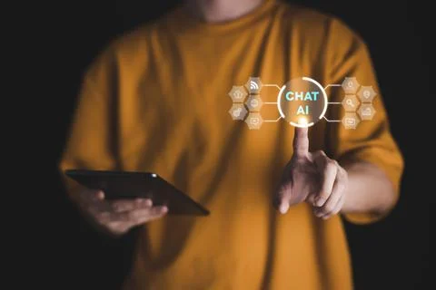 AI (Artificial intelligence), Chatbot growing concept. Businessman hand use.. Stock Photos