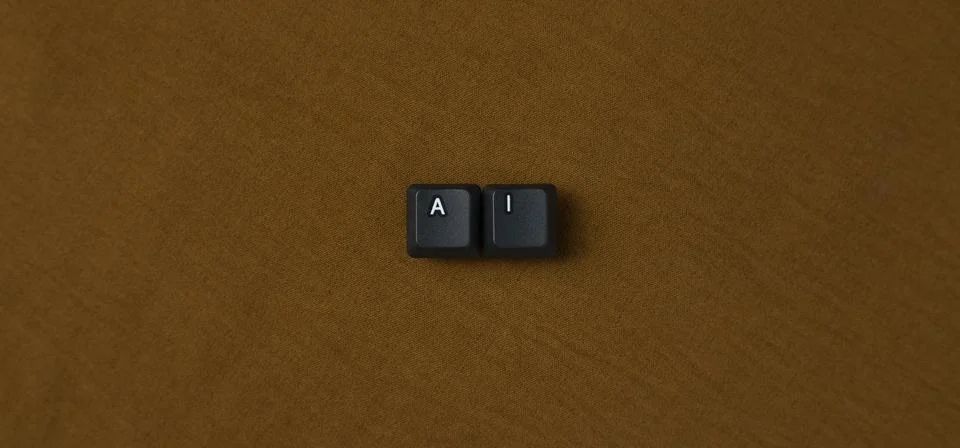 AI Artificial Intelligence Concept With Keyboard Keys On Brown Background Fotos Stock